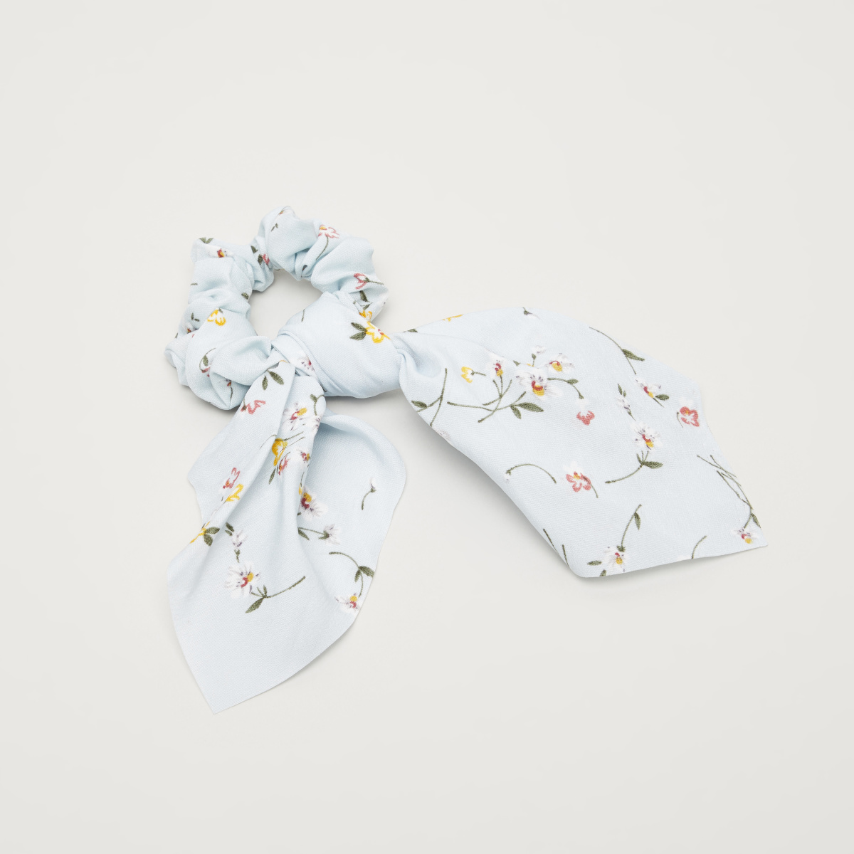 ربطة شعر مطاطية بتفاصيل رباط وطبعات أزهار